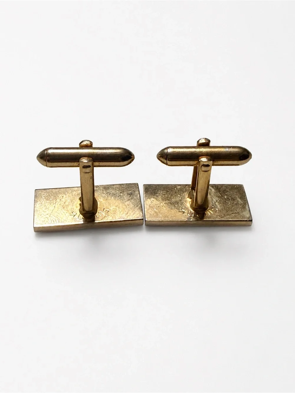 Vintage Swank rectangle etched cuff links in gold tone metal retro